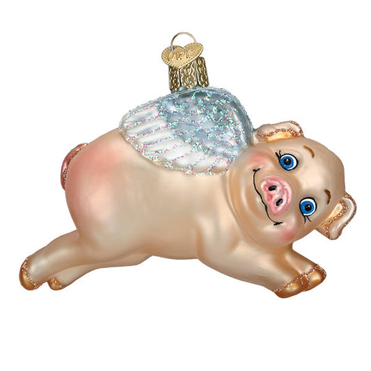 Flying Pig Glass Ornament, artisan handcrafted decor, whimsical design celebrating unexpected victories.