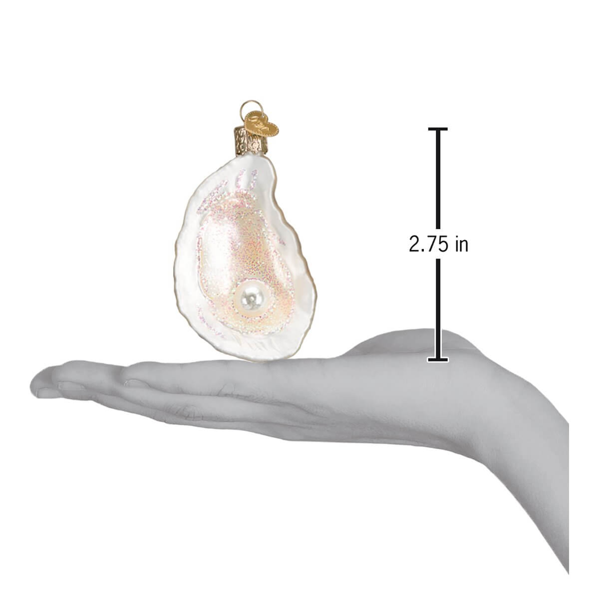 Oyster With Pearl Ornament held in hand for scale, showcasing artisan handcrafted decor with a natural pearl.