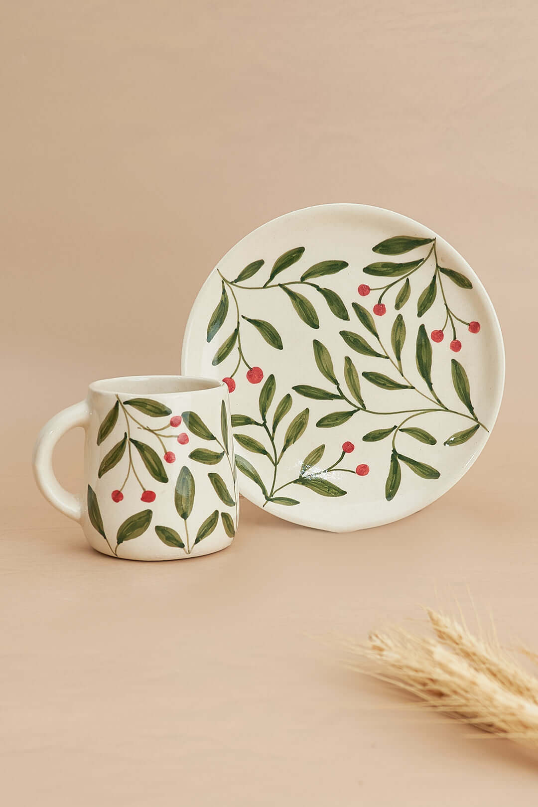 Holly Leaf Plate Set in Olive | Stoneware Snack Plates featuring a mug and plate with green leaves and berries design.