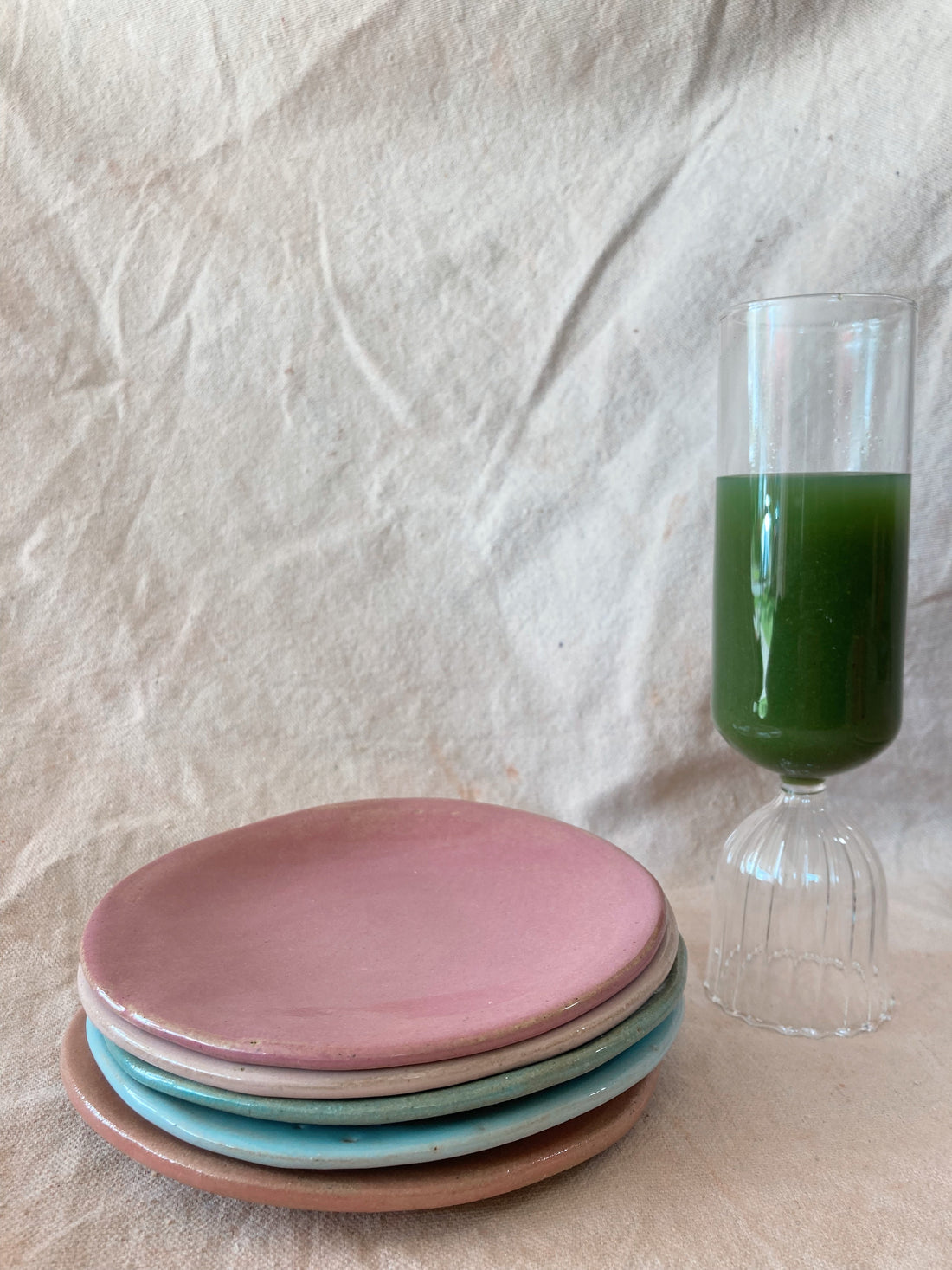 Artisan stoneware plate styled for an elegant dining table by Marilu