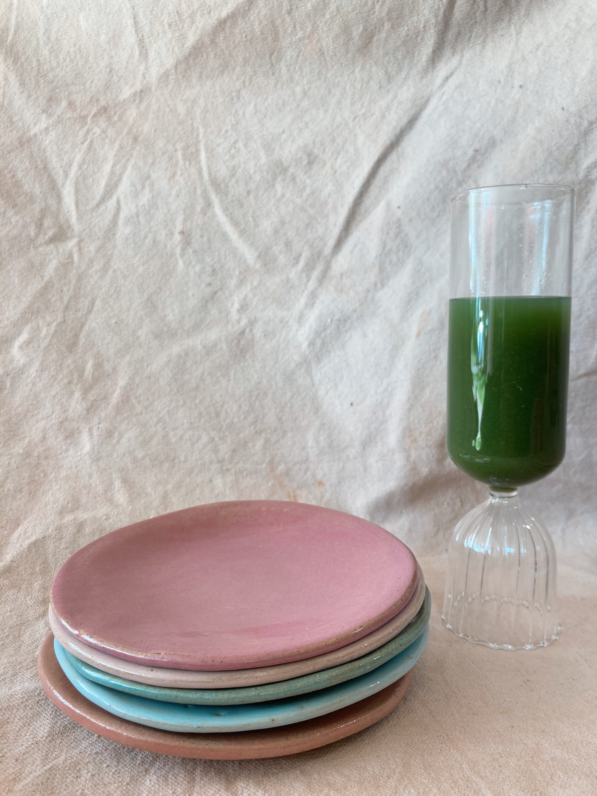 Artisan stoneware plate styled for an elegant dining table by Marilu