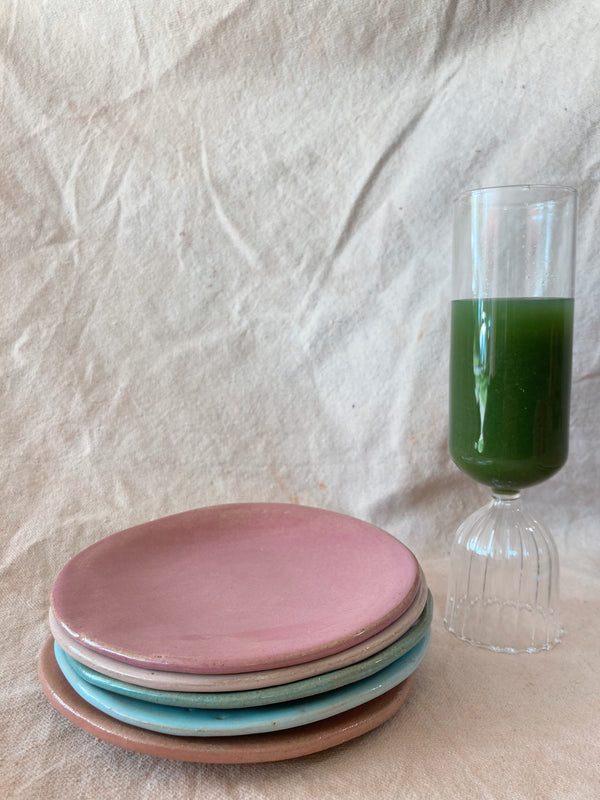 Artisan stoneware plate styled for an elegant dining table by Marilu