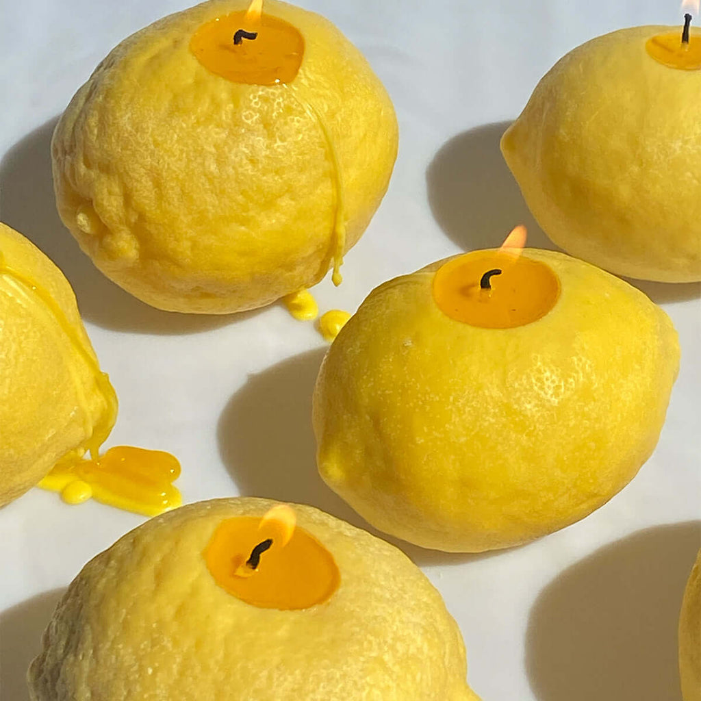 Large Lemon Candle - handcrafted artisan decor that brightens any space with its citrus aroma.