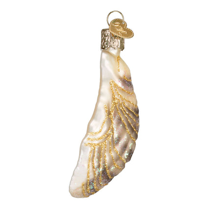 Artisan Oyster With Pearl Ornament, handcrafted decor featuring elegant golden details.