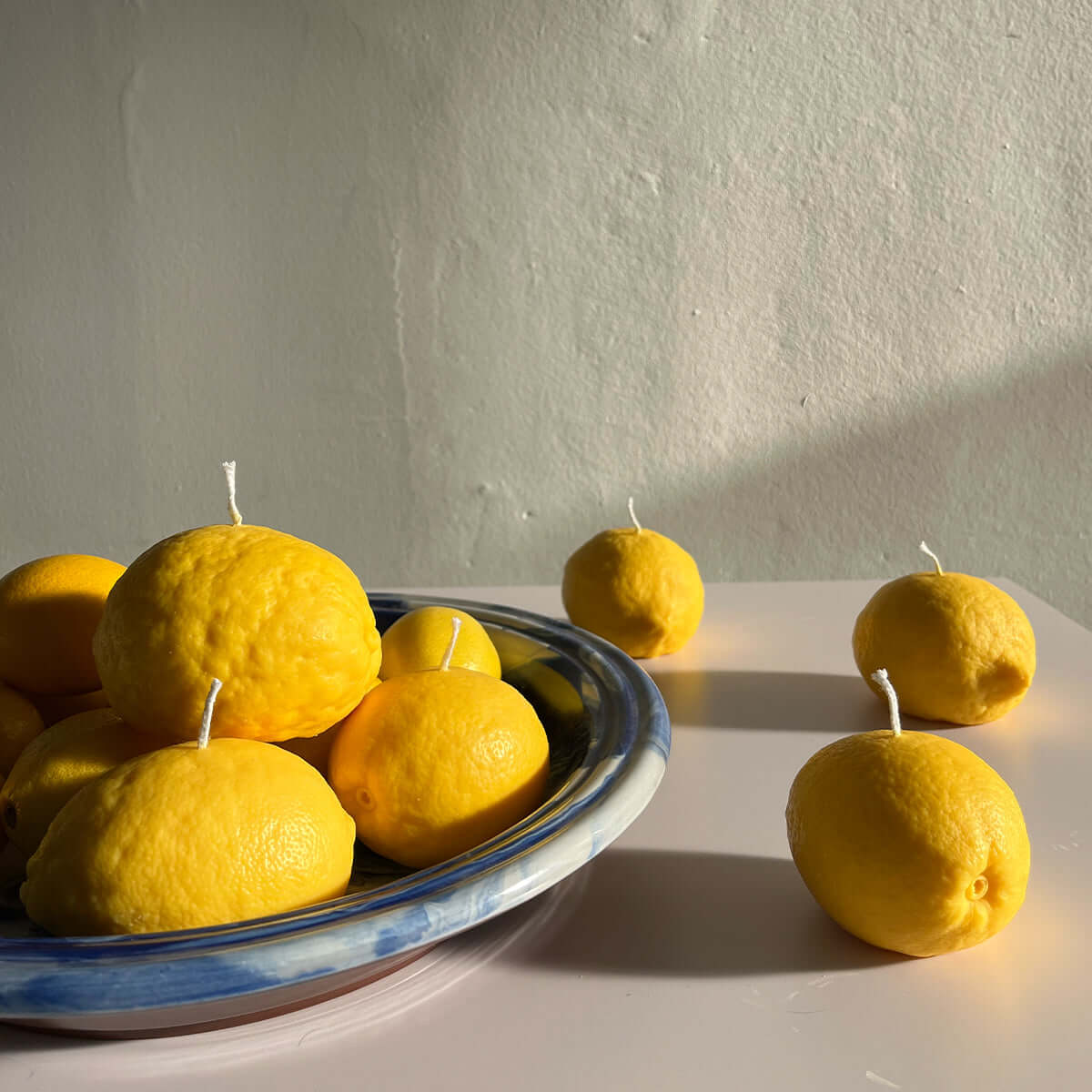 Large Lemon Candle in a decorative bowl, artisan handcrafted decor bringing freshness to your space.