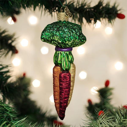 Rainbow Carrots Ornament, handcrafted artisan decor, colorful carrot ornament hanging on a Christmas tree.