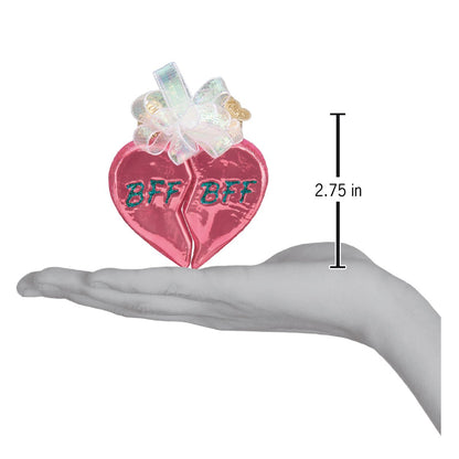 Bff Hearts Ornament shown in hand, a handcrafted artisan decor item celebrating friendship.