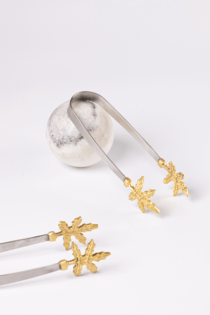 Elegant Brass Leaf Tongs, handcrafted decor piece combining artisan beauty and functionality.