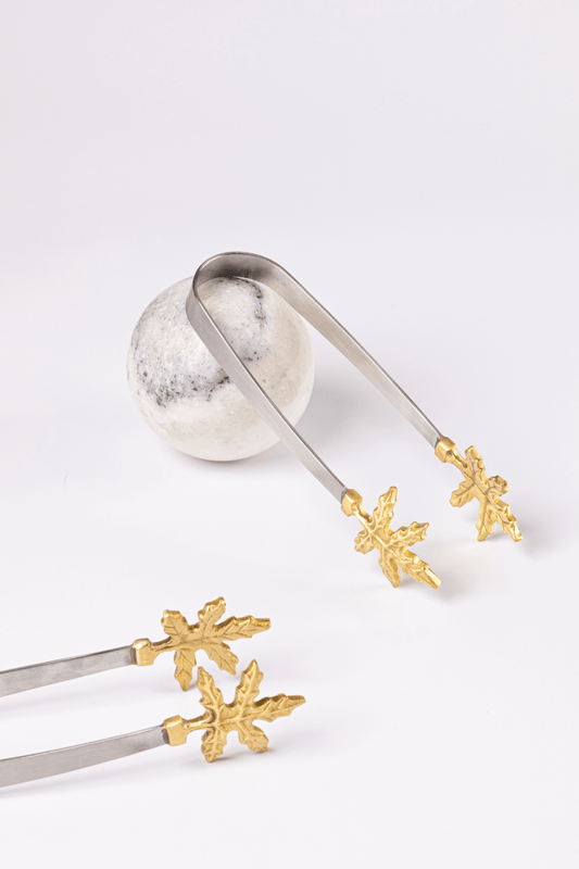 Elegant Brass Leaf Tongs, handcrafted decor piece combining artisan beauty and functionality.
