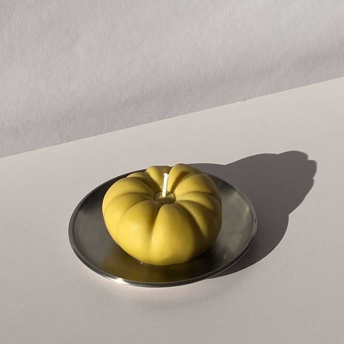 Heirloom Tomato Candle - Orange on a round metal tray, artisan handcrafted decor item made from natural soy wax.