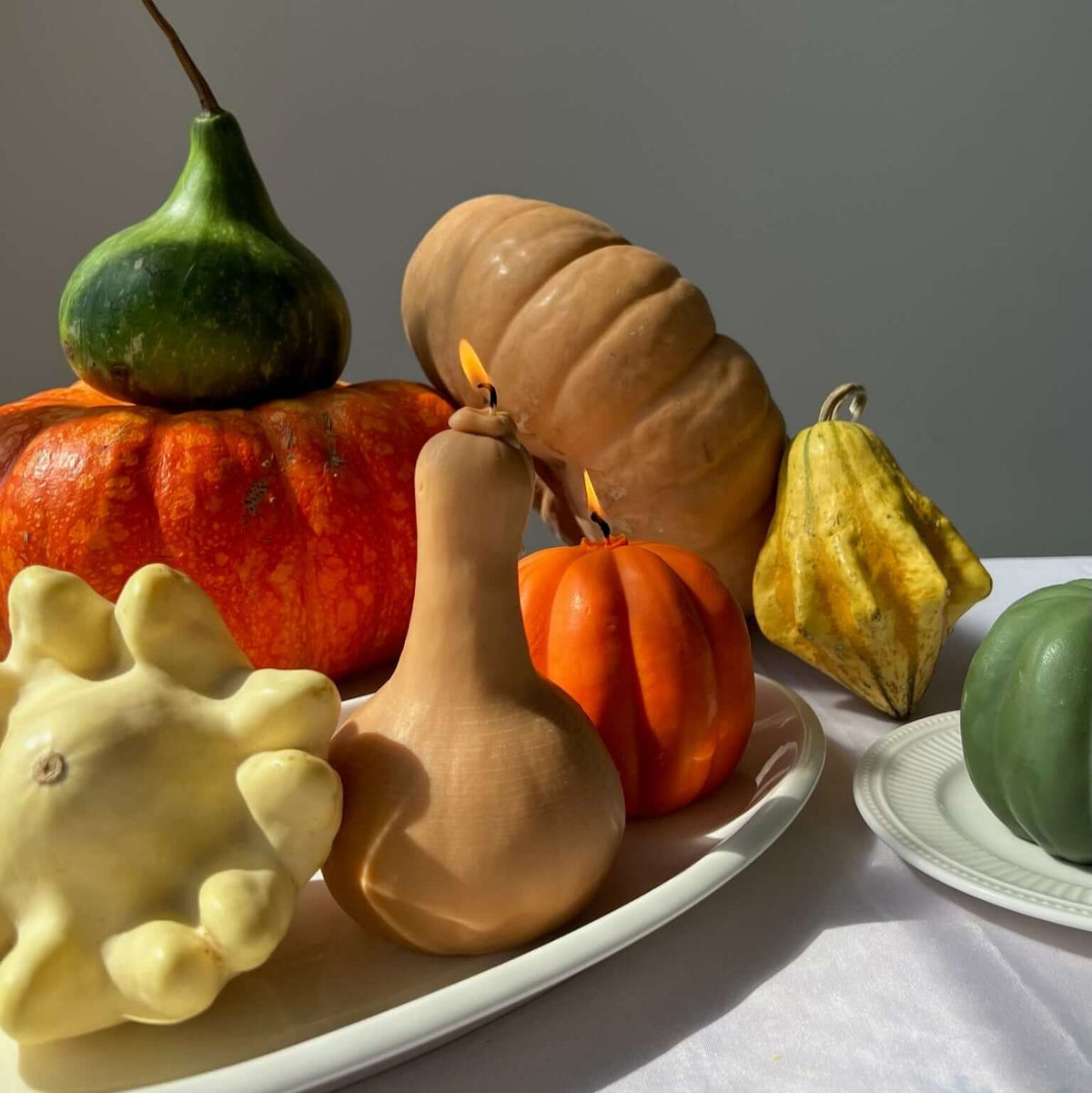 Artisan Squash Candle display featuring handcrafted decor from our Farmers Market Collection.