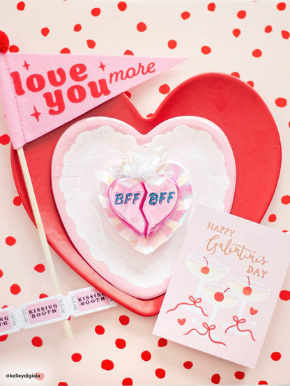 Bff Hearts Ornament on a decorative plate with Valentine's Day card and festive décor, celebrating true friendship.