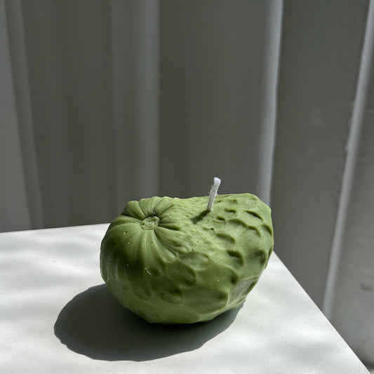 Cherimoya Candle in artisanal design, handcrafted soy wax, perfect decor for a tropical-themed space.