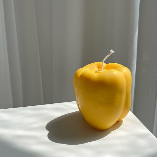 Bell Pepper Candle - Yellow artisan handcrafted decor in a vibrant yellow, perfect for any handmade aesthetic.