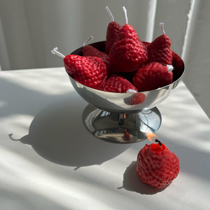 Strawberry Candles - 8 Pack in a silver bowl, showcasing artisan handcrafted decor with a delightful berry design.